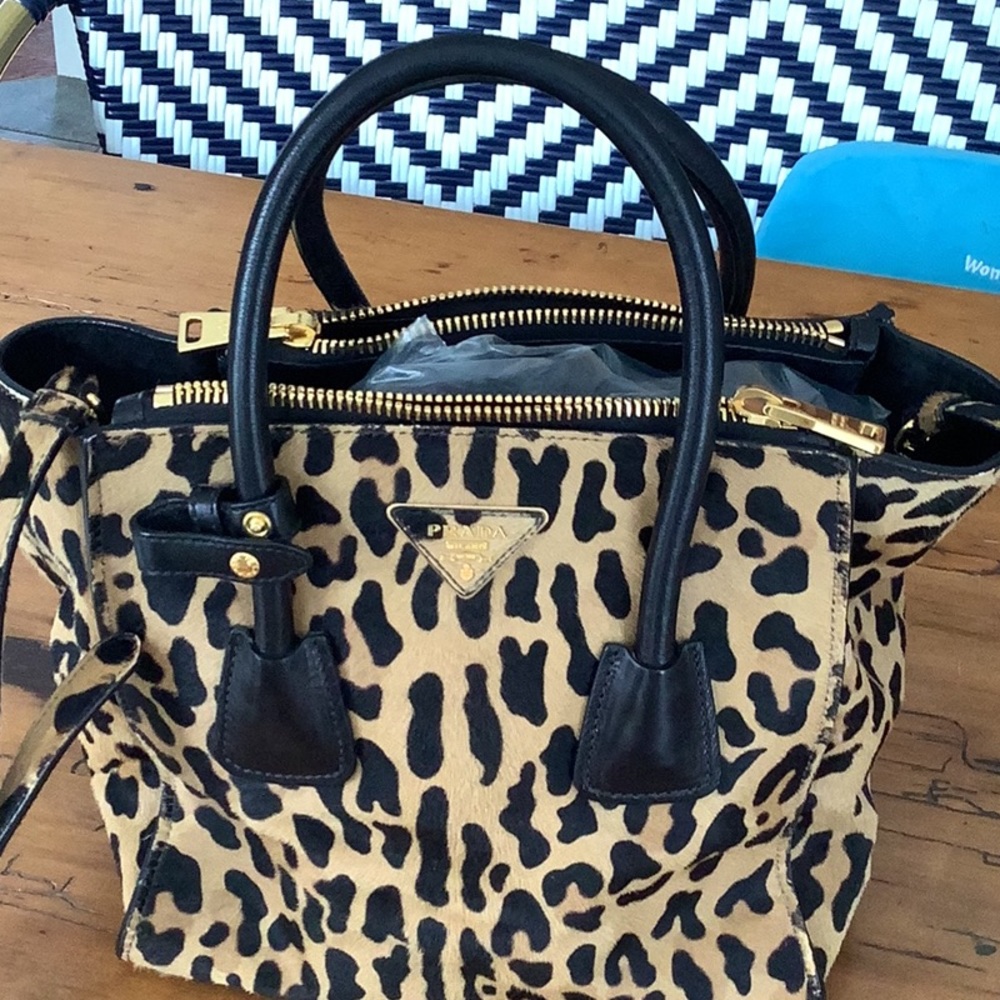 Prada calf hair bag..leopard print..Tote or shoulder.  Like new. 3 zippers.